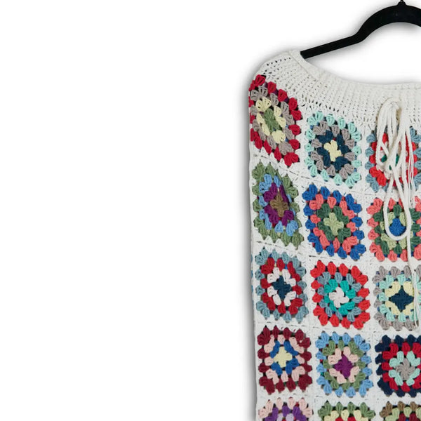 Colorful crocheted  with geometric patterns on a white background