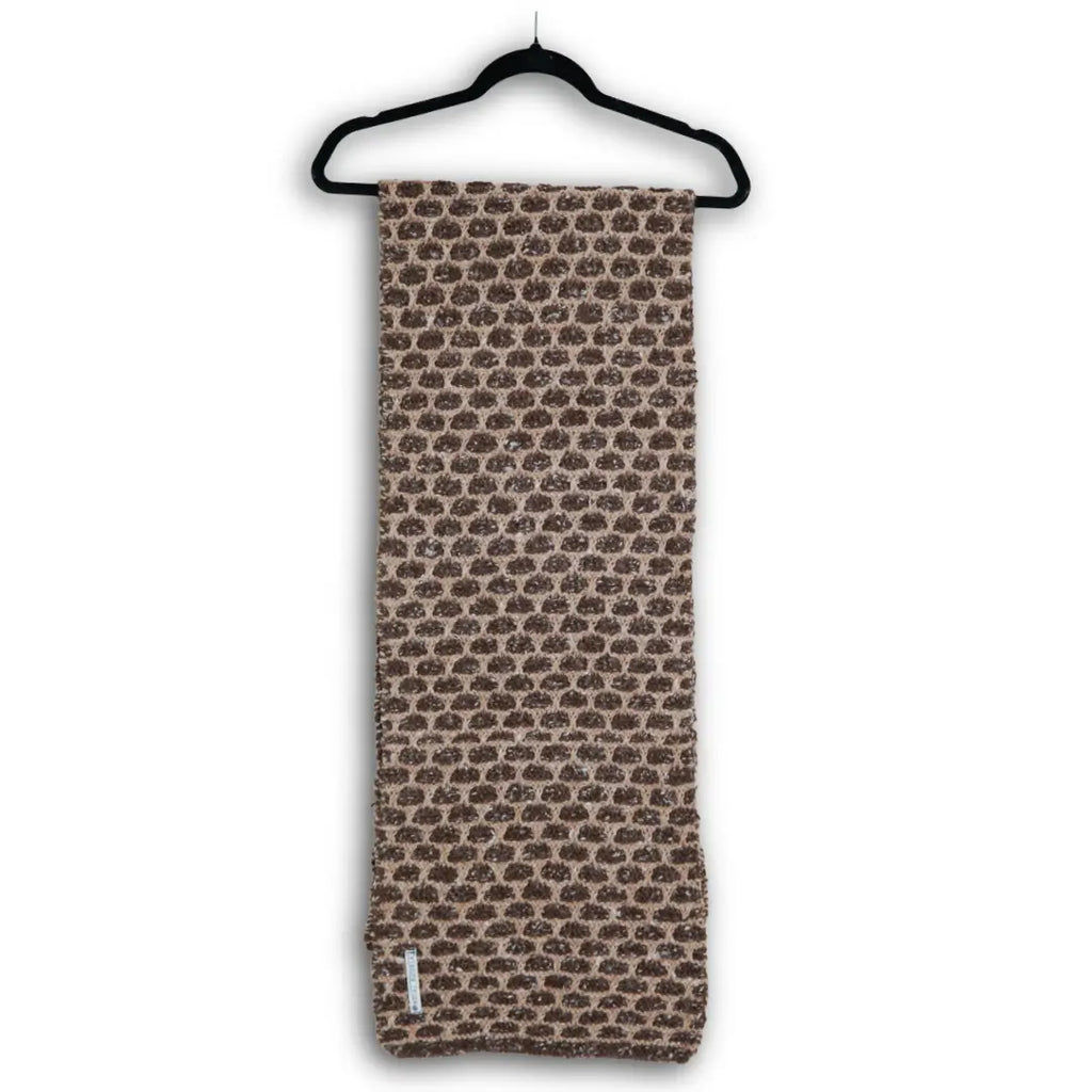 Hand-knitted brown and cream Himalayan wool muffler with a traditional all-over geometric pattern, ethically made by indigenous Lahaul Valley artisans for sustainable luxury fashion
