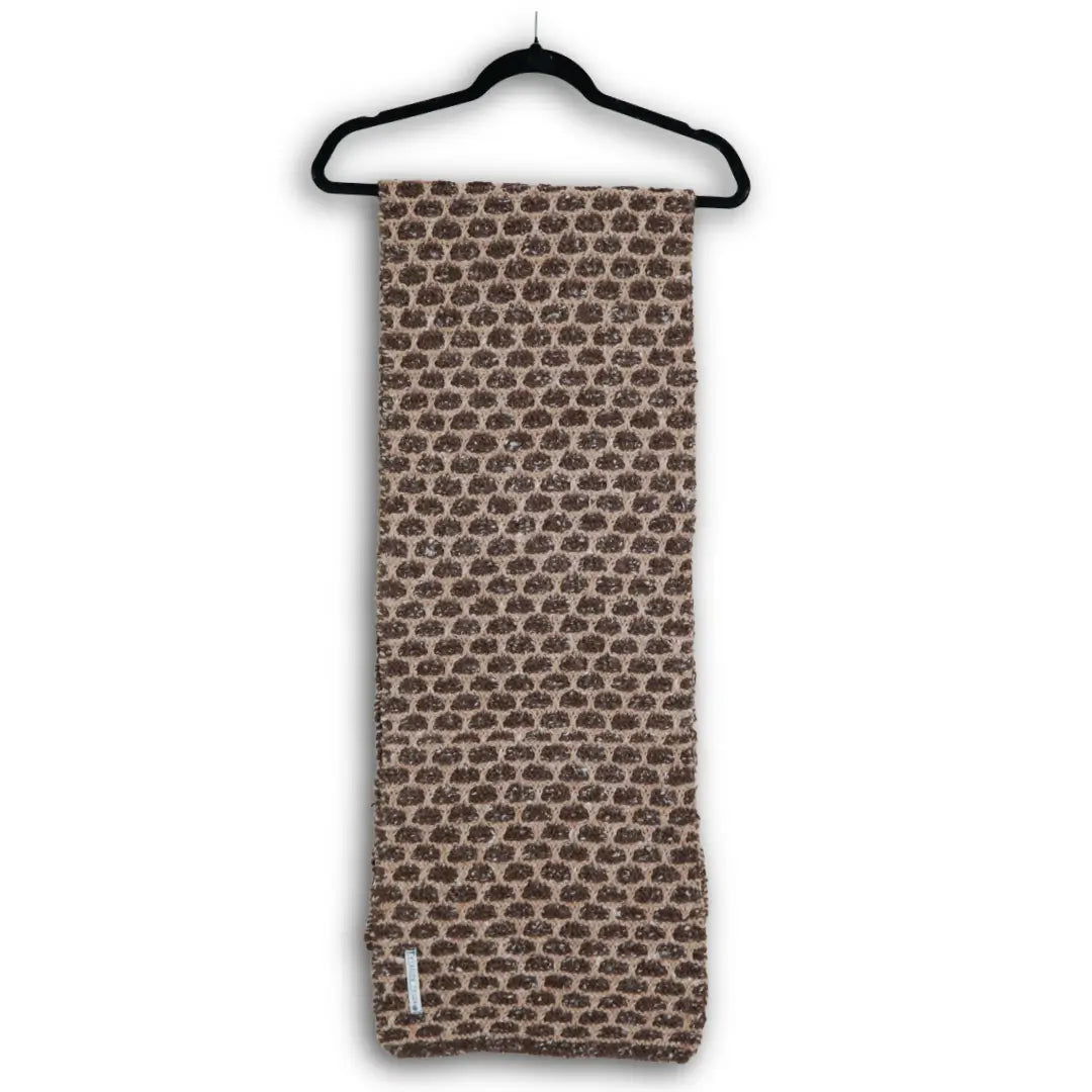 Hand-knitted brown and cream Himalayan wool muffler with a traditional all-over geometric pattern, ethically made by indigenous Lahaul Valley artisans for sustainable luxury fashion